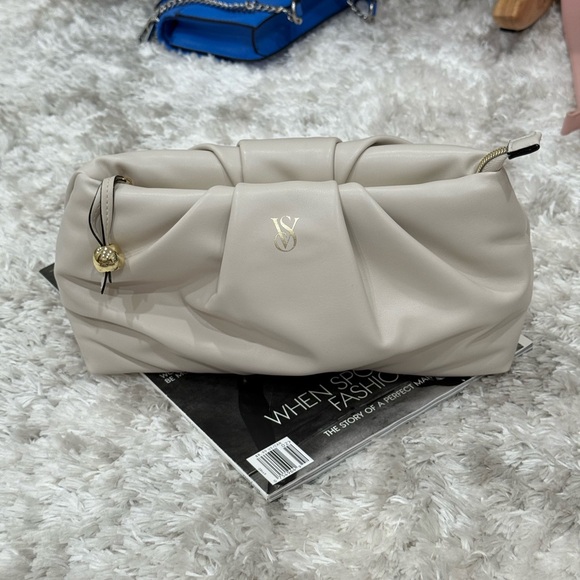 Victoria's Secret Handbags - Victoria’s Secret Soft Beige Clutch Bag
